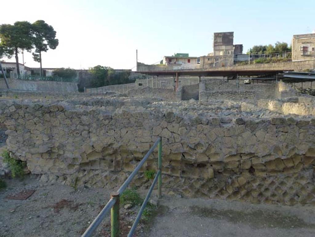 III, 19/18/1, Herculaneum. October 2012. Looking west from Cardo IV Inferiore, across rooms on south side of atrium. Photo courtesy of Michael Binns.